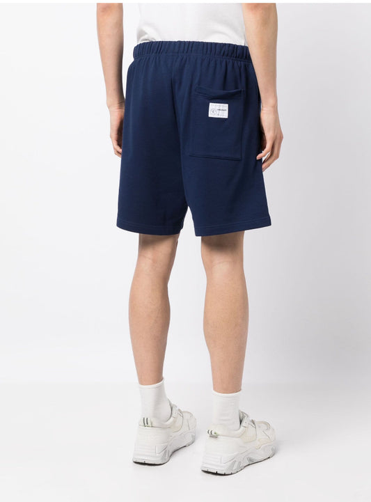 CHOCOOLATE
Logo-embroidered cotton shorts